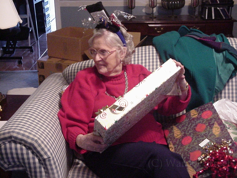 Alice Opening A Present.jpg